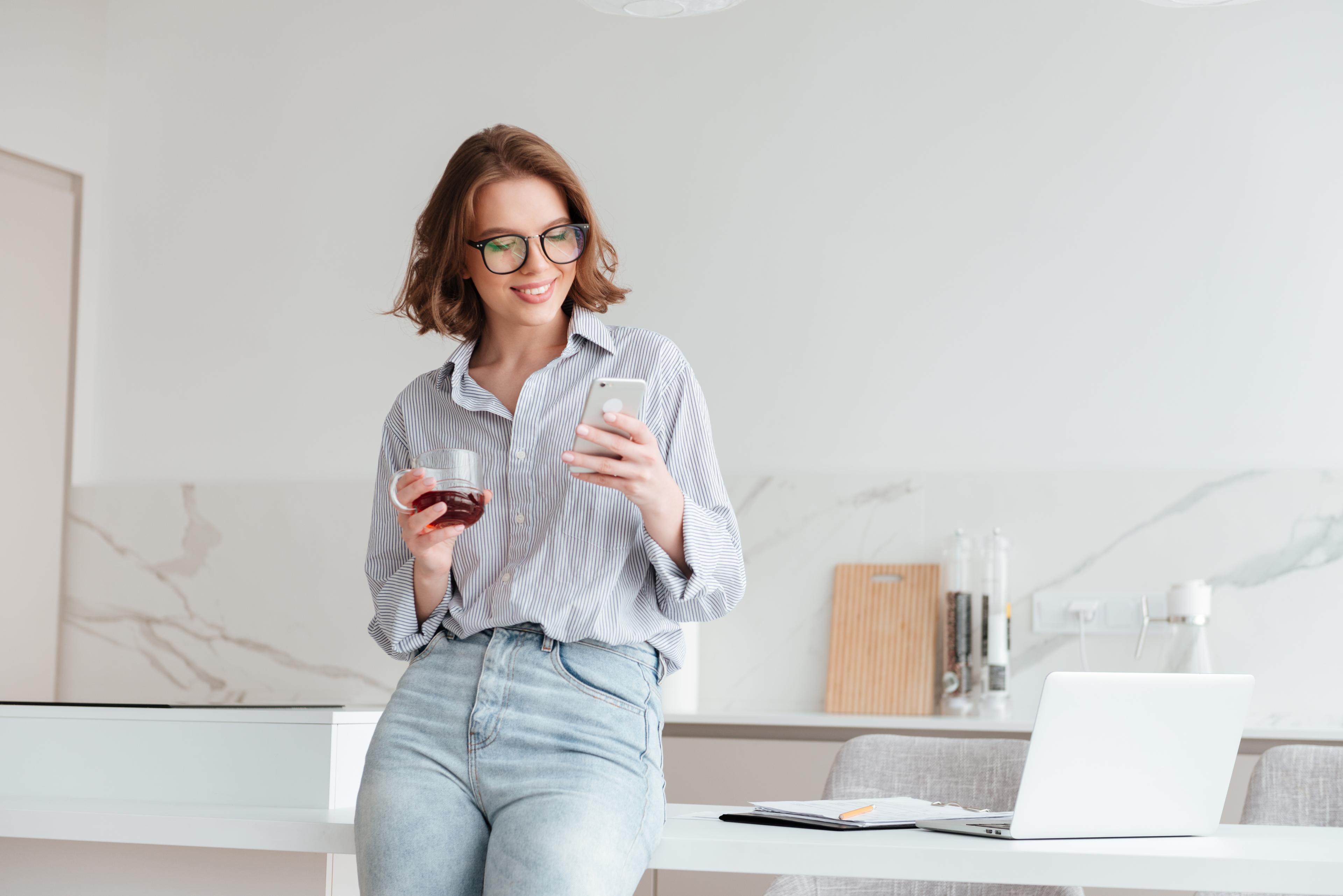woman looking at her mobile